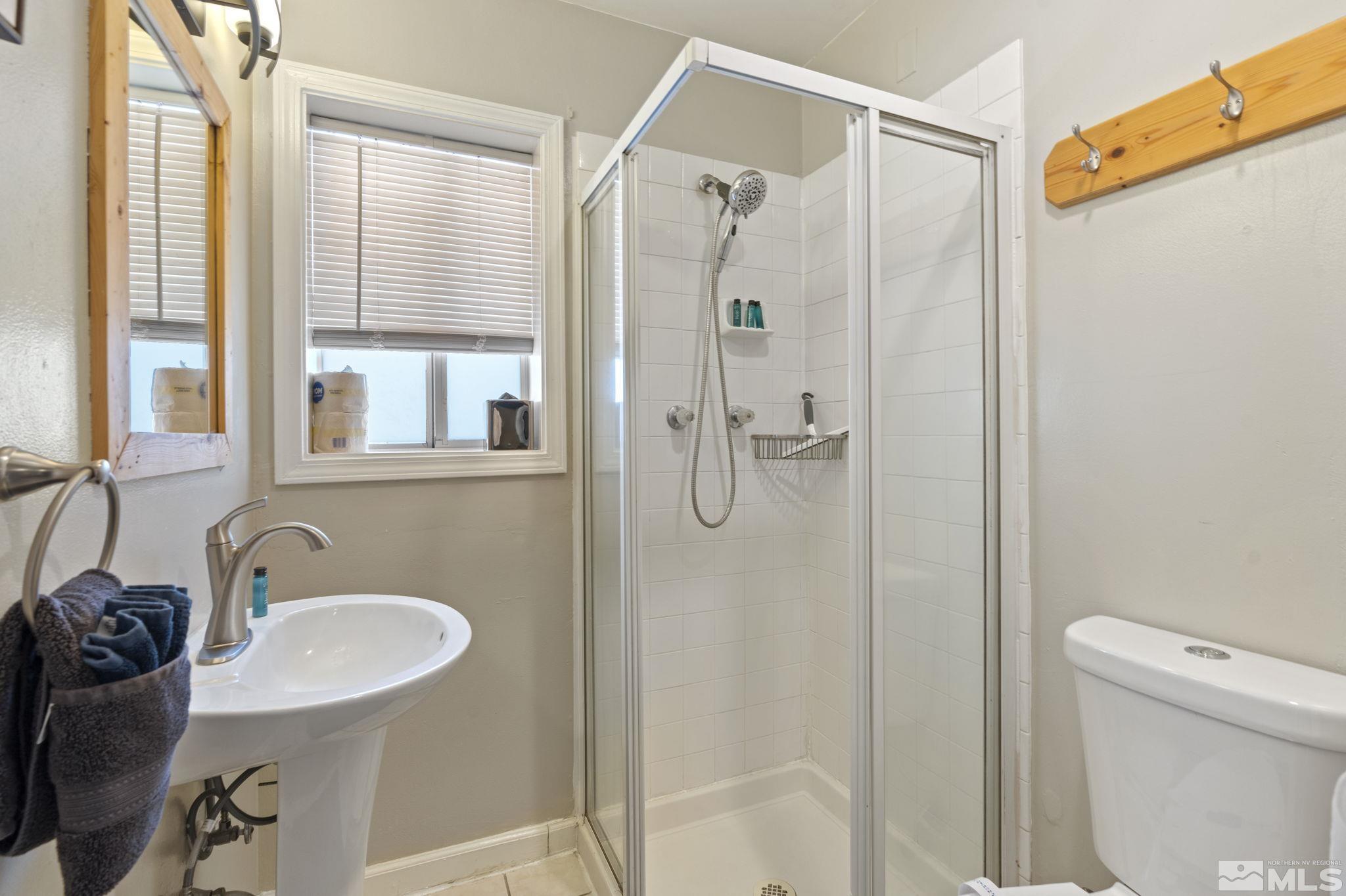 840 Bates Avenue Reno, NV 89502 - Photo 20 of 39 a bathroom with a sink toilet and shower