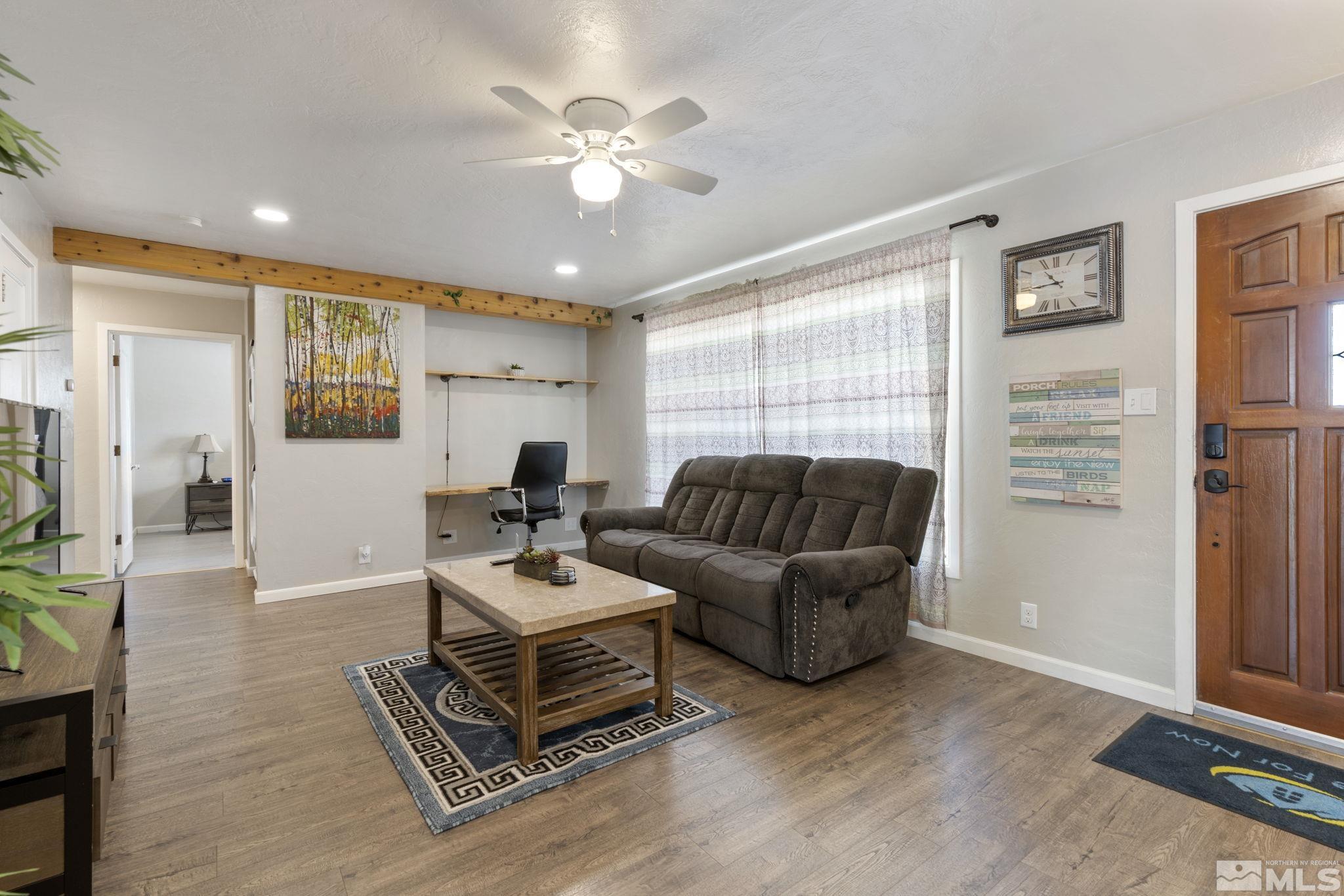 840 Bates Avenue Reno, NV 89502 - Photo 4 of 39 a living room with furniture and a large window