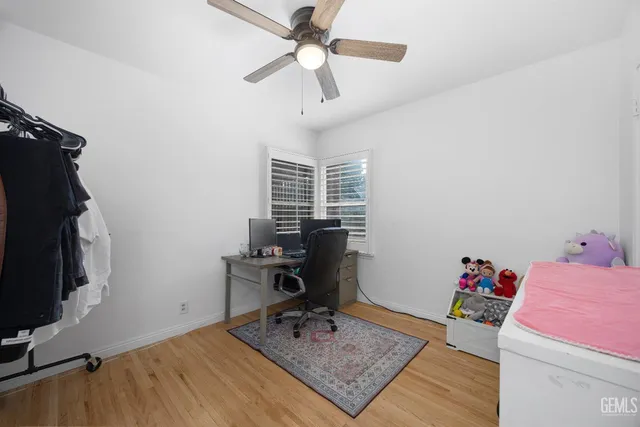 a workspace with furniture and a window