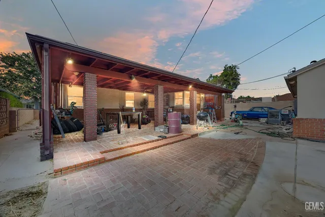 a view of a building with sitting area