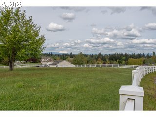 Northwest 214th Circle Ridgefield, WA 98642 - Photo 15 of 21 a view of a lake and a yard
