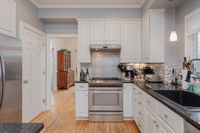 a living room with a couch and a table