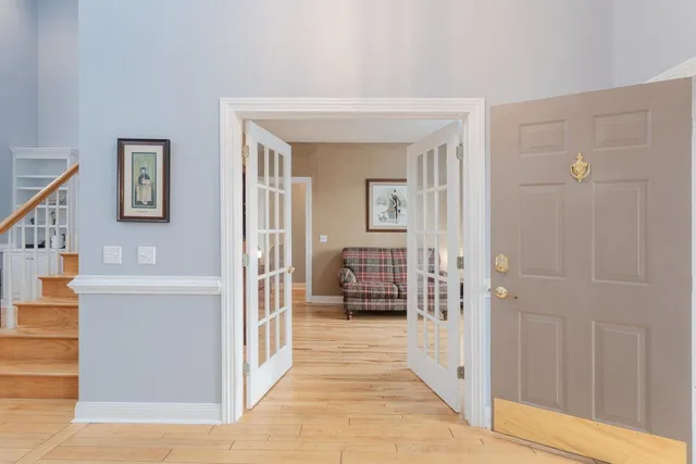 a room with furniture and a wooden floor