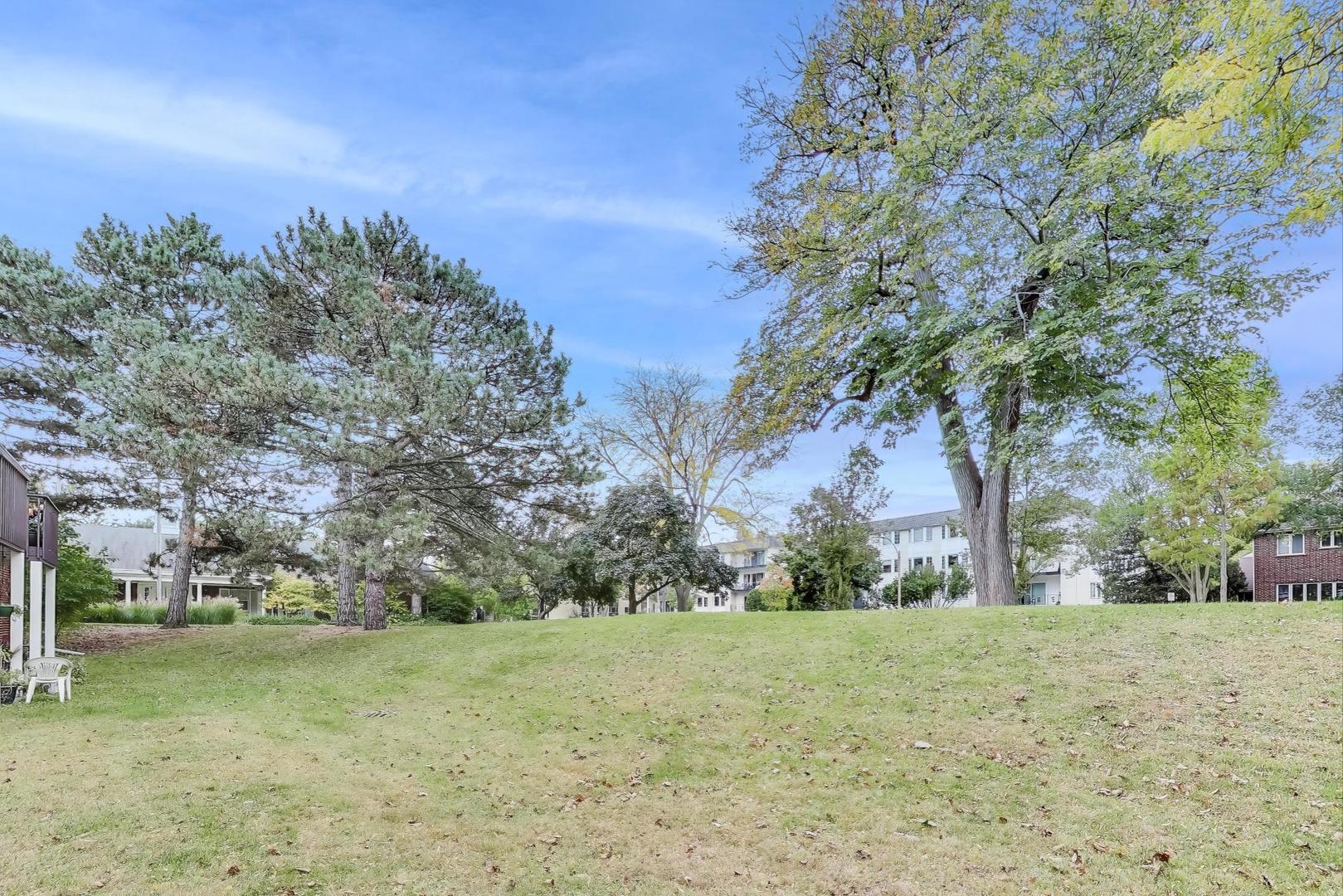 800 Ridge Road, Unit 114 Wilmette, IL 60091 - Photo 22 of 23 a view of a field with trees