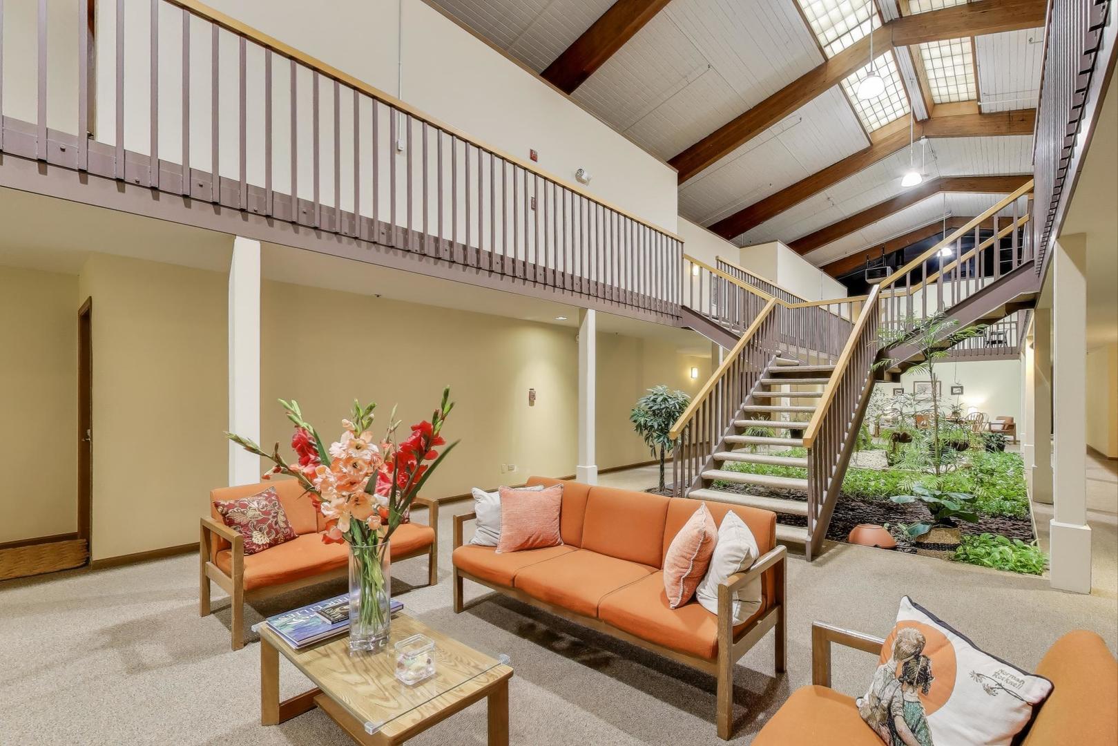 800 Ridge Road, Unit 114 Wilmette, IL 60091 - Photo 5 of 23 a outdoor living space with furniture and a potted plant