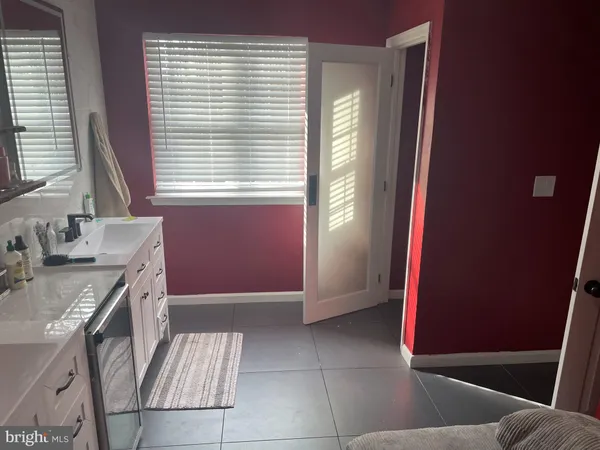 a view of an empty room with window