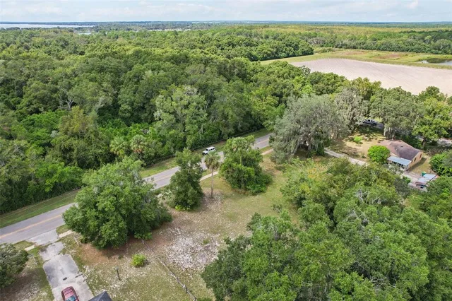 a view of a garden with a lake view