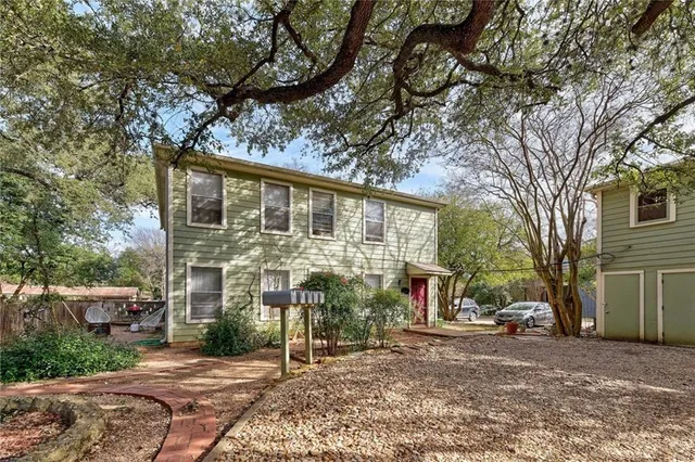 a view of a street with houses