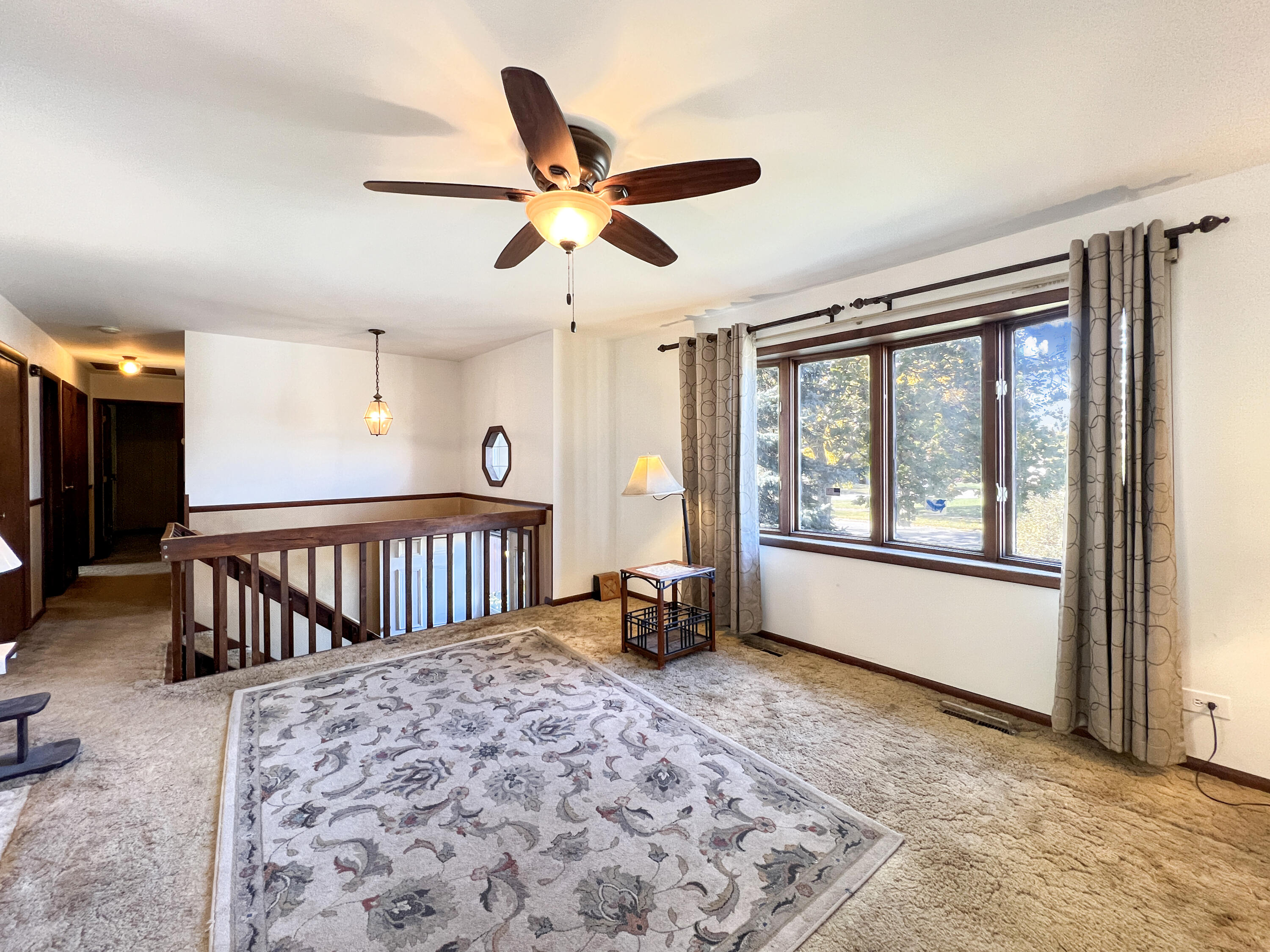 7431 West 83rd Lane Crown Point, IN 46307 - Photo 3 of 13 a very nice looking room with a large window