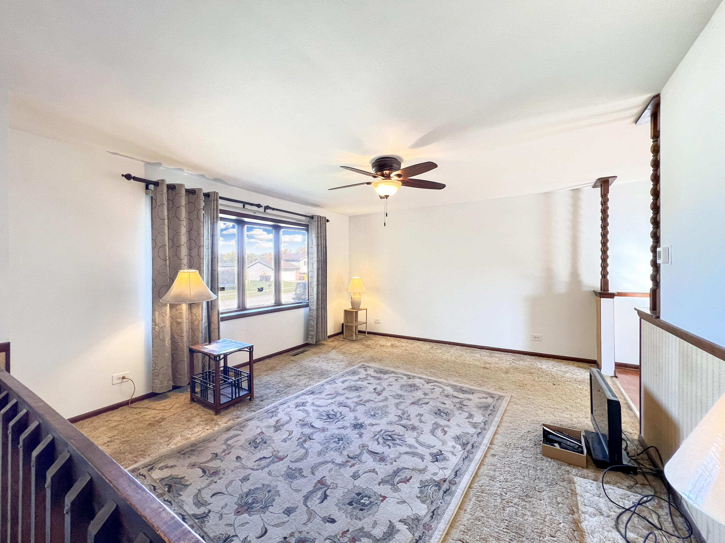 7431 West 83rd Lane Crown Point, IN 46307 - Photo 4 of 13 a living room with furniture and a window