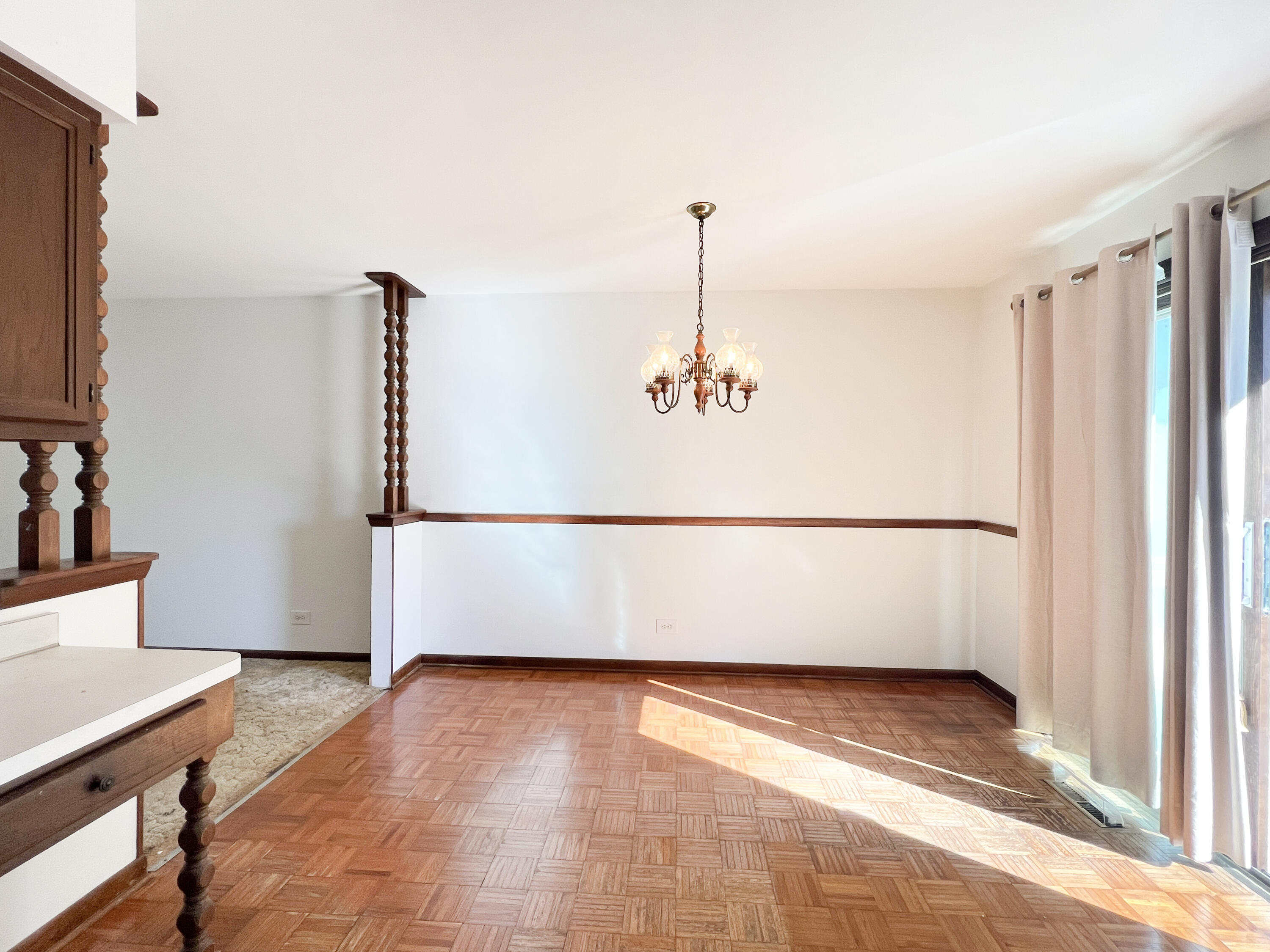 7431 West 83rd Lane Crown Point, IN 46307 - Photo 6 of 13 a view of empty room with wooden floor and fan