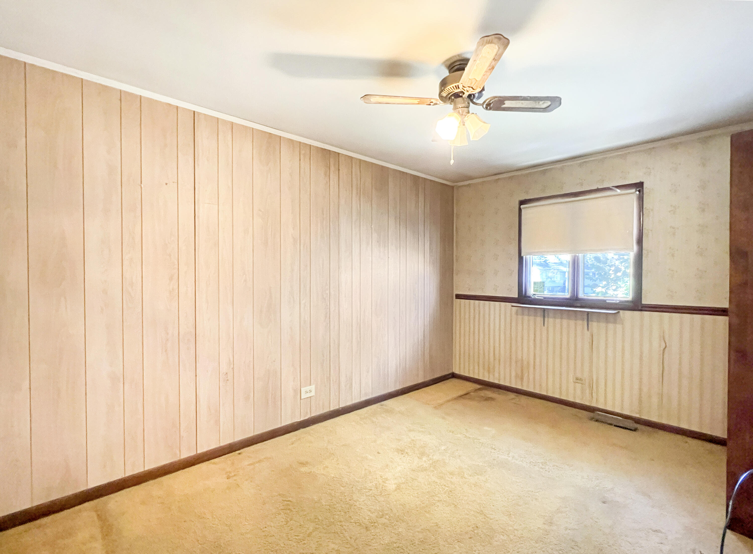 7431 West 83rd Lane Crown Point, IN 46307 - Photo 10 of 13 a view of an empty room with a window