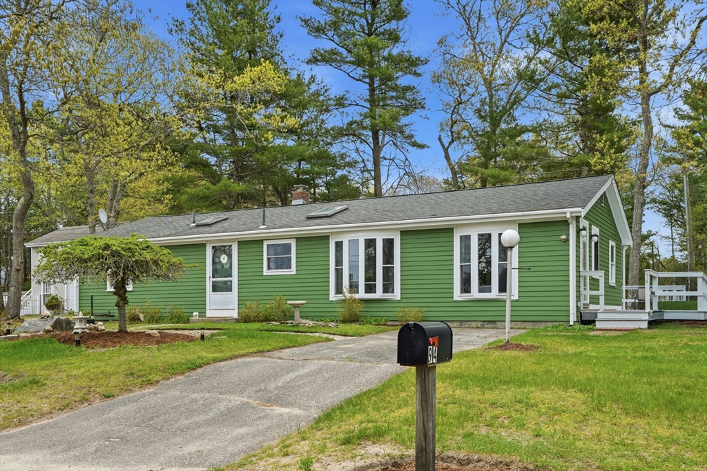 94 Edgewater Drive Wareham, MA 02571 - Photo 3 of 37 front view of a house with a yard