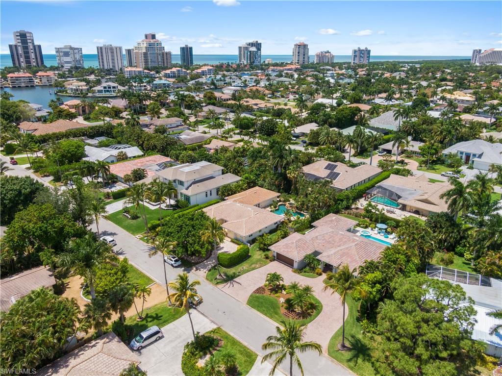 521 Turtle Hatch Road Naples, FL 34103 - Photo 33 of 34 an aerial view of a city with lots of residential buildings