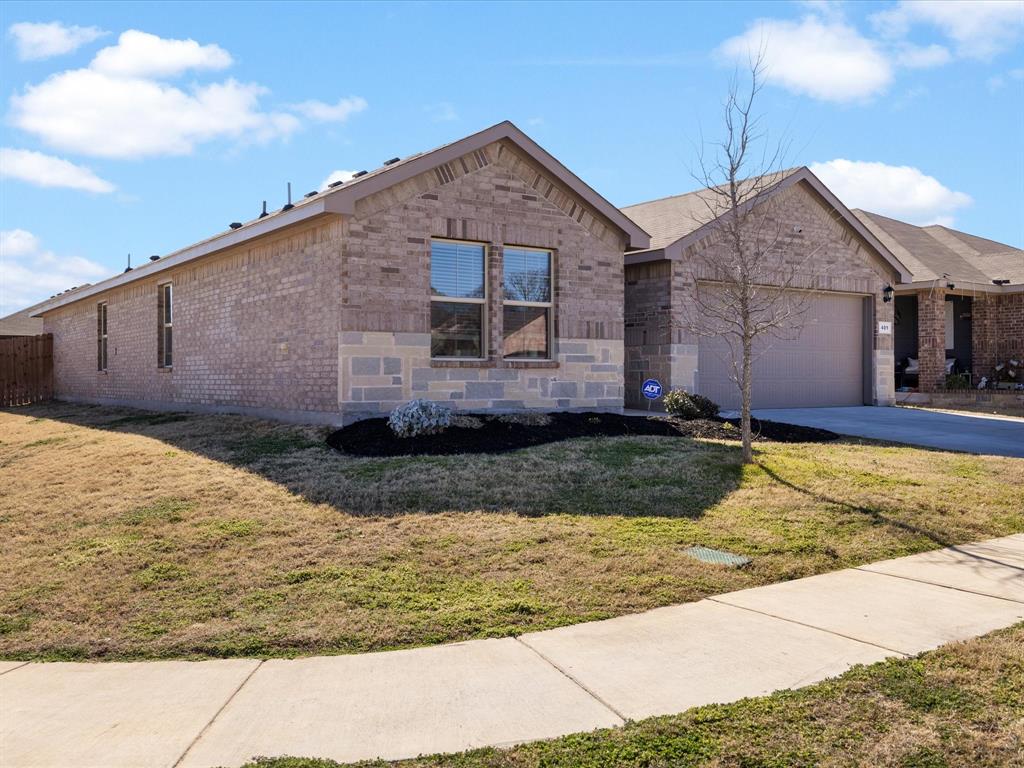 401 Attalla Street Azle, TX 76020 - Photo 23 of 24 a view of a house with a yard