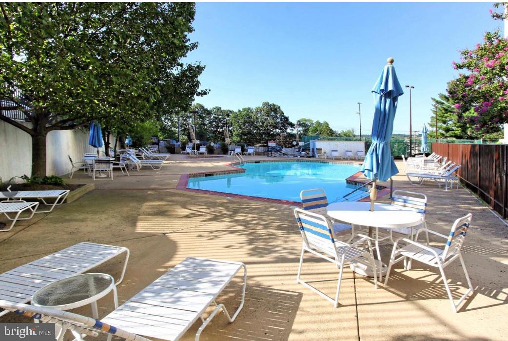 6101 Edsall Road, Unit 1206 Alexandria, VA 22304 - Photo 51 of 52 a view of a swimming pool with a patio