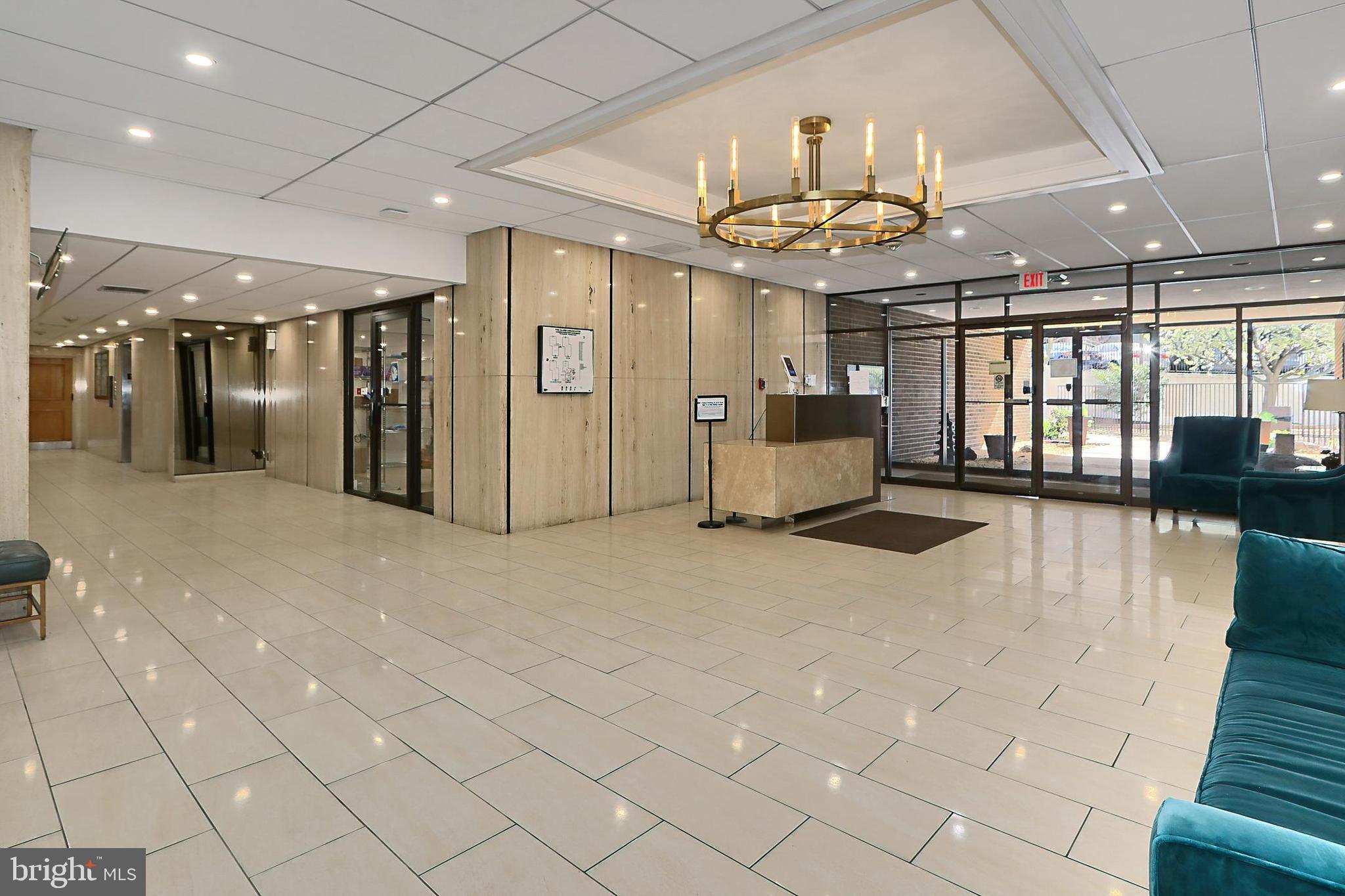 6101 Edsall Road, Unit 1206 Alexandria, VA 22304 - Photo 6 of 52 a view of a lobby with furniture