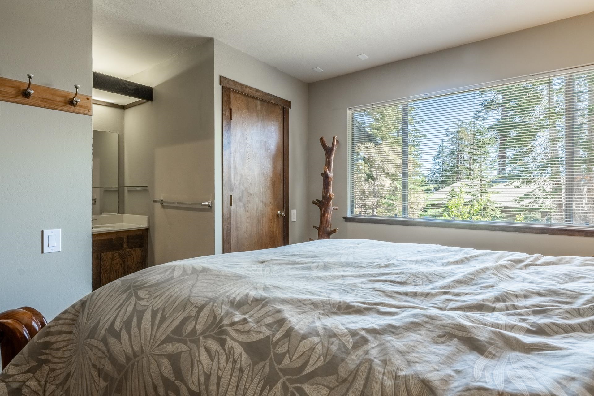 94 John Muir Road, Unit 132 Mammoth Lakes, CA 93546 - Photo 23 of 58 a bedroom with a bed and a large window