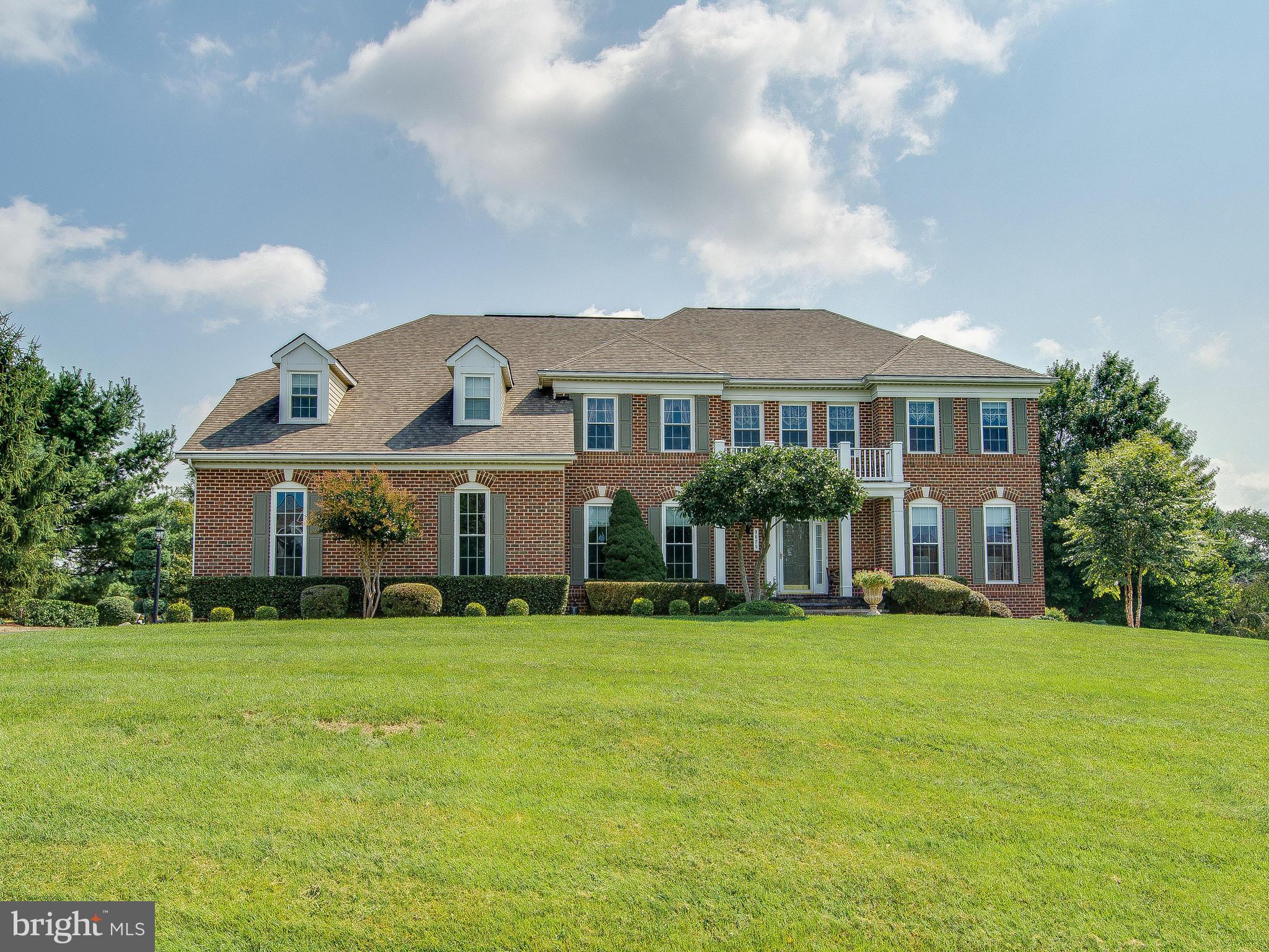 Front View With Professional Landscaping