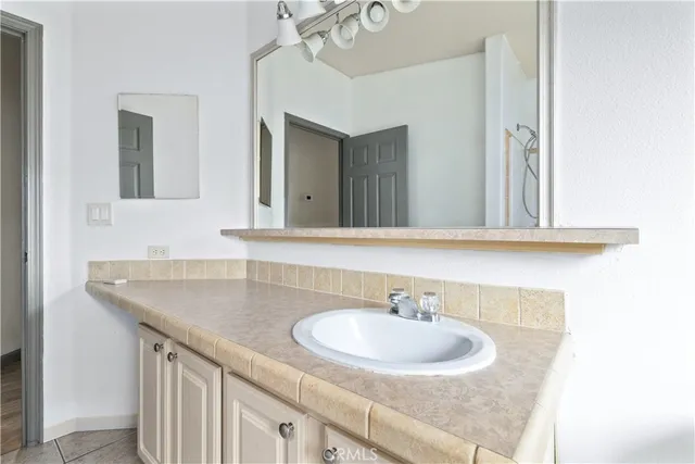 a bathroom with a bath tub and a shower