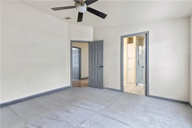 a bathroom with a sink vanity and a mirror