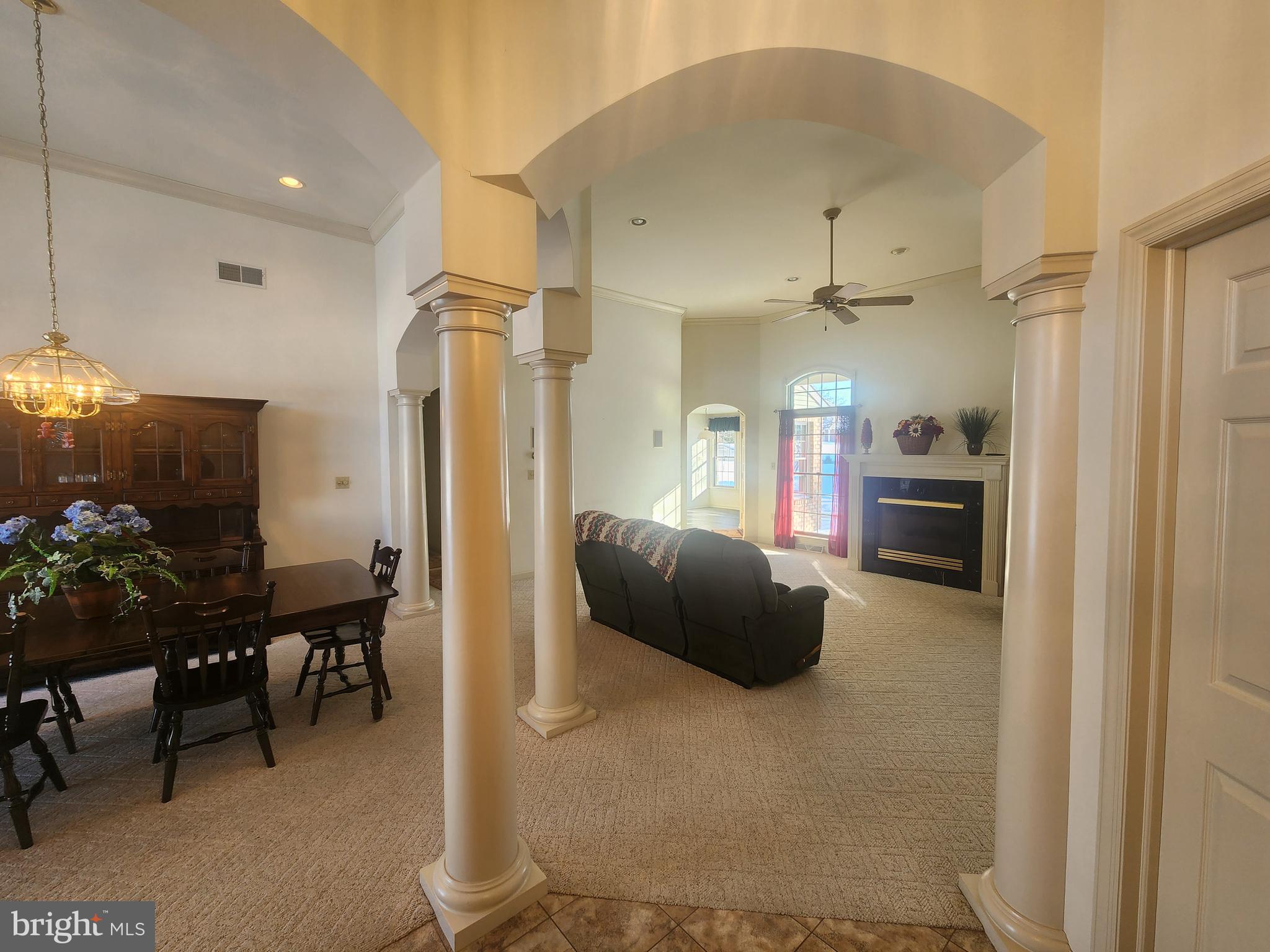 33 Tara Drive Lititz, PA 17543 - Photo 12 of 53 a living room with furniture and a chandelier