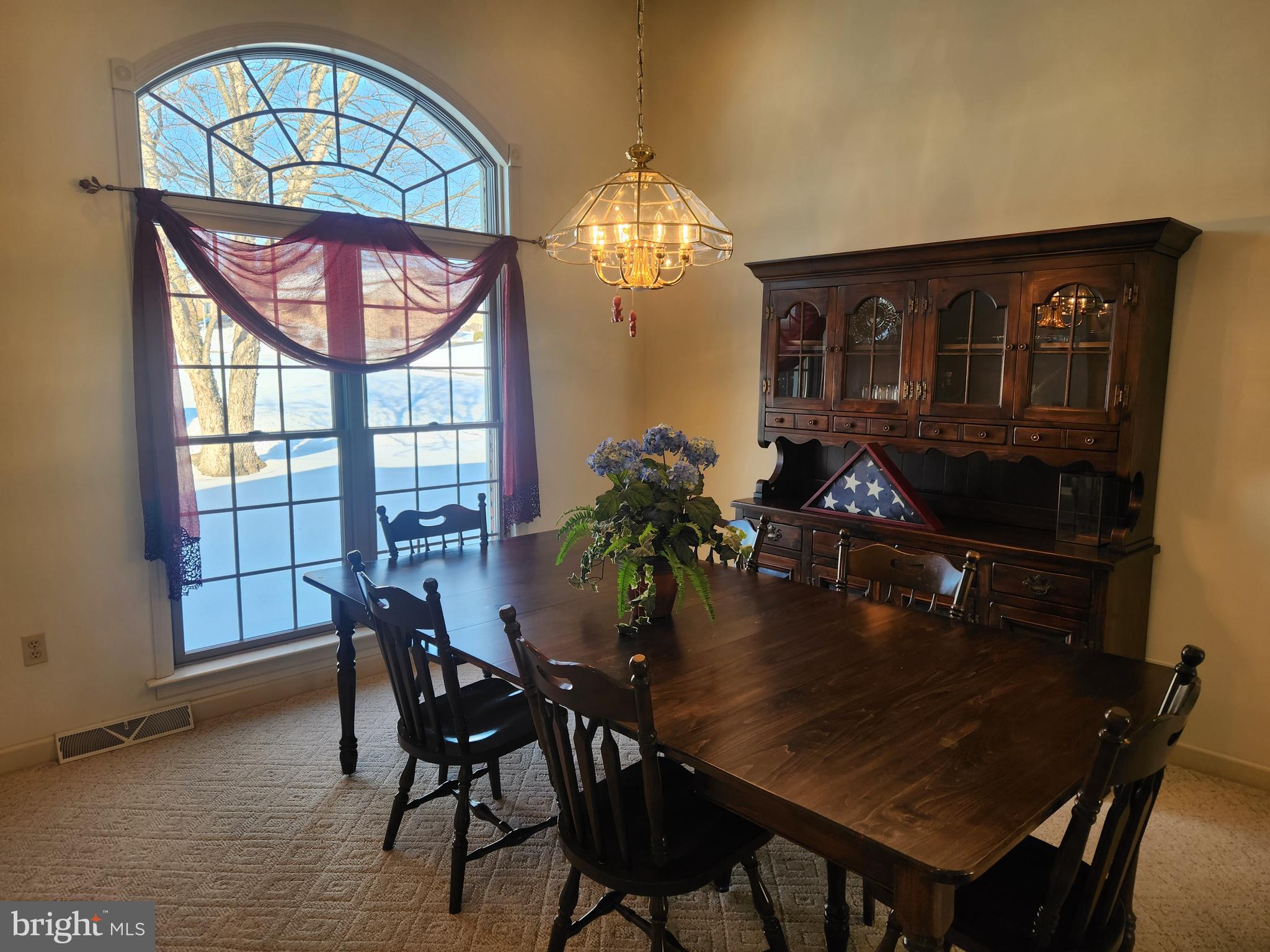 33 Tara Drive Lititz, PA 17543 - Photo 14 of 53 a view of a dining room with furniture and chandelier