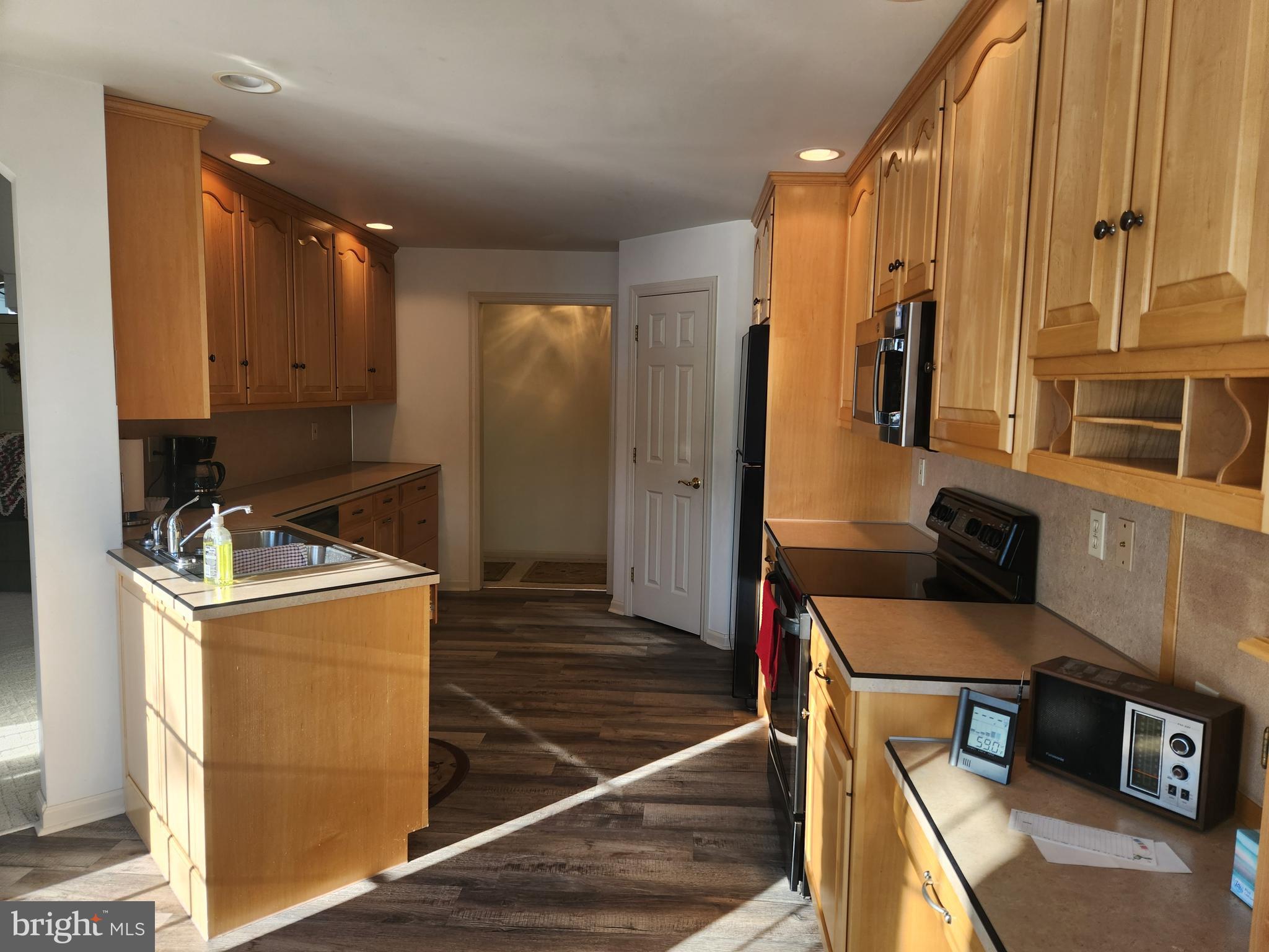 33 Tara Drive Lititz, PA 17543 - Photo 21 of 53 a kitchen with stainless steel appliances granite countertop a stove and a refrigerator