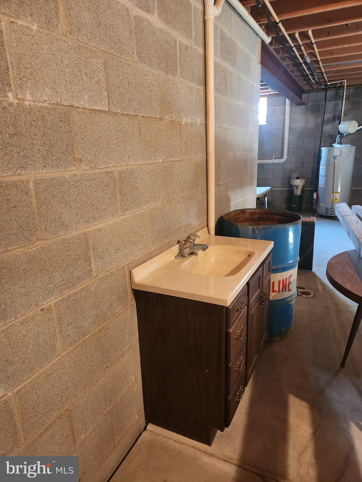33 Tara Drive Lititz, PA 17543 - Photo 51 of 53 a utility room with a sink a washer and dryer