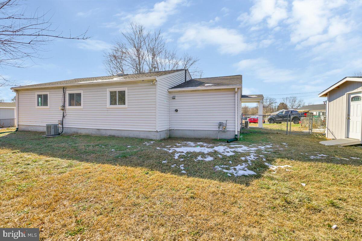 6200 Auth Road Suitland, MD 20746 - Photo 30 of 30 a view of a house with a yard