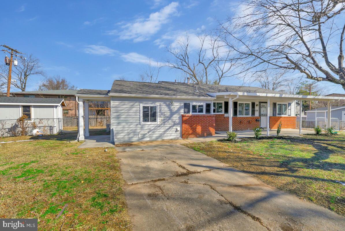 6200 Auth Road Suitland, MD 20746 - Photo 3 of 30 front view of a house with a big yard