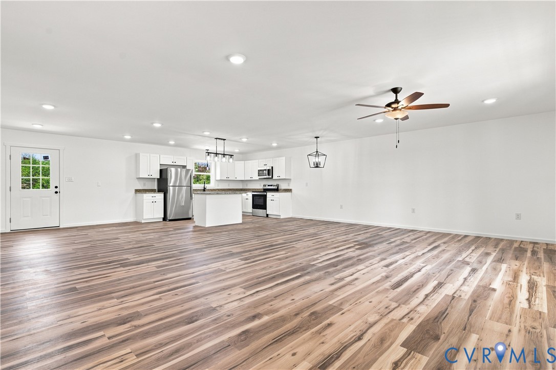 104 Abrams Road Farmville, VA 23901 - Photo 4 of 25 Open-concept living space featuring wood-finish fl