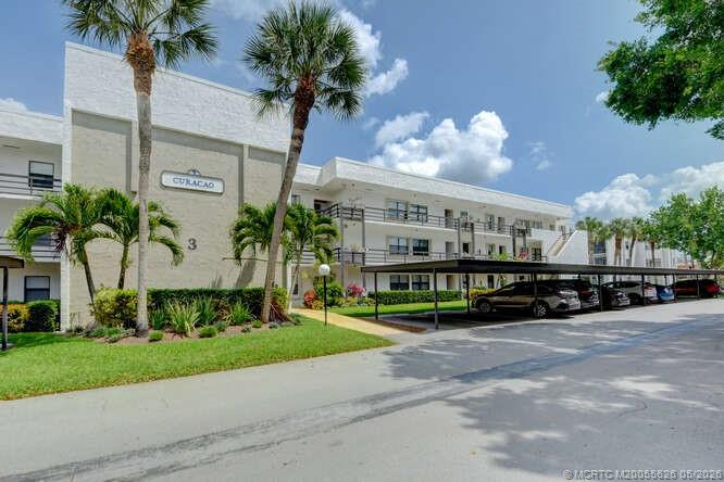 1950 Southwest Palm City Road, Unit 3209 Stuart, FL 34994 - Photo 4 of 64 Building 3, Elevator and Covered Parking.