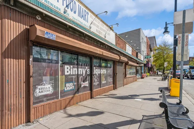 a view of a building with sitting area
