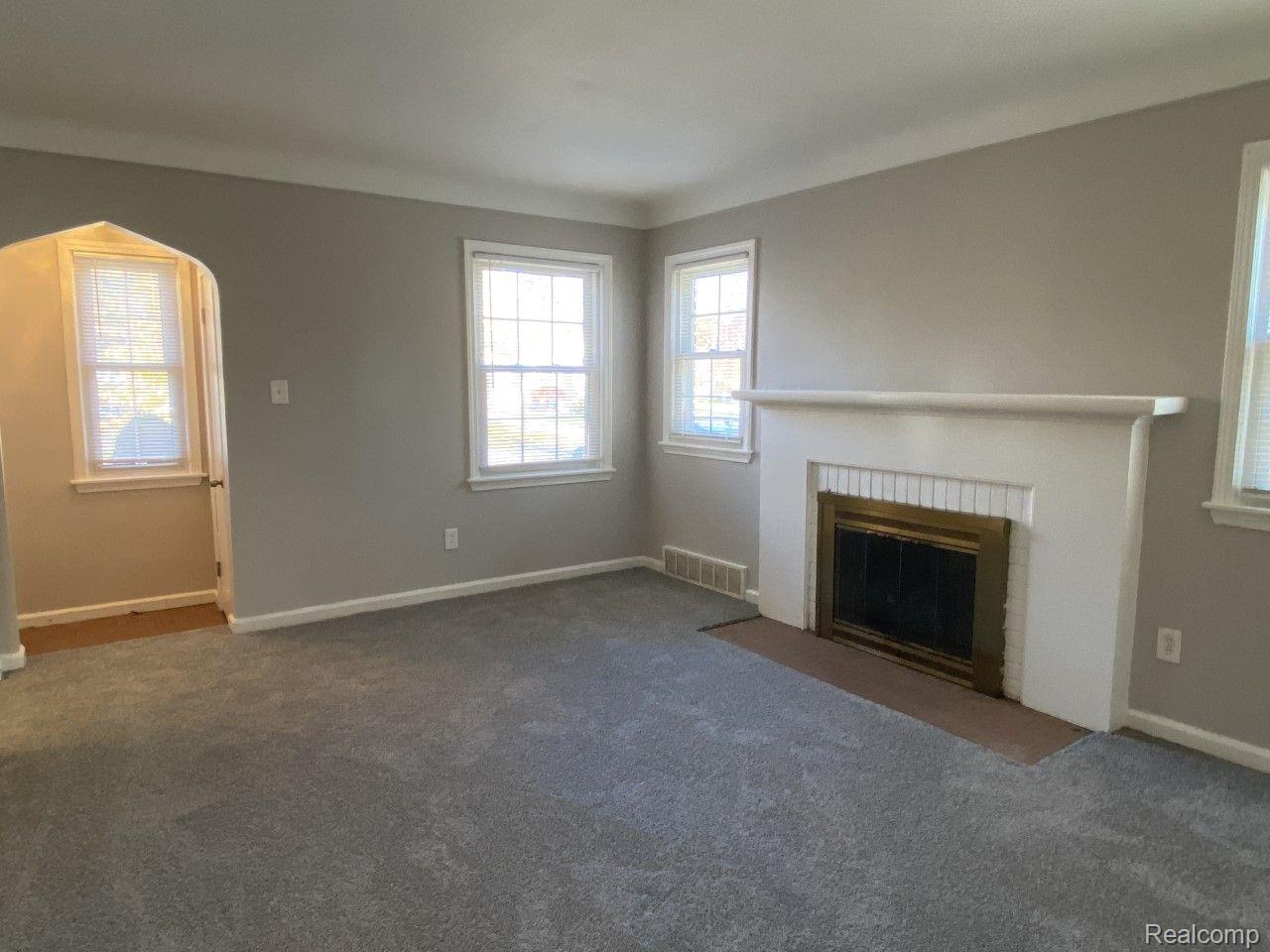 2247 Hawthorne Road Harper Woods, MI 48225 - Photo 3 of 20 Living Room with Natural Fireplace
