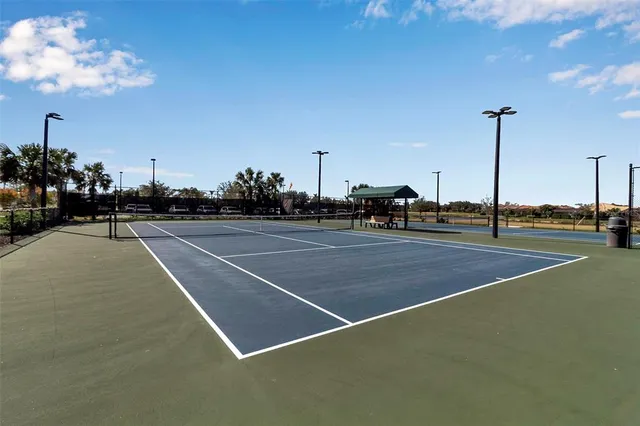 a view of a big dining room with furniture window and outside view