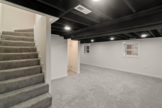 1018 North Harding Avenue Chicago, IL 60651 - Photo 16 of 38 a view of an empty room with stairs