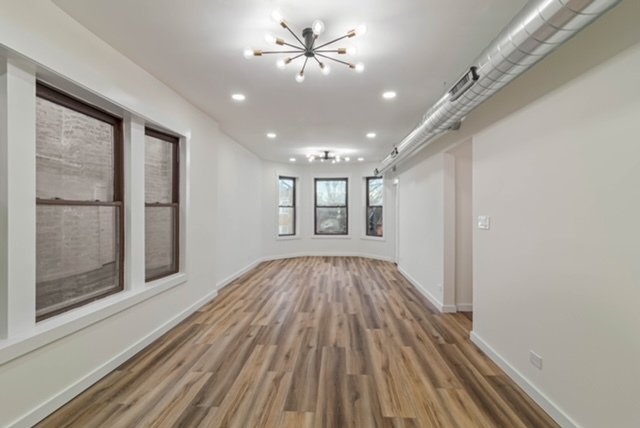 1018 North Harding Avenue Chicago, IL 60651 - Photo 22 of 38 a view of gallery with wooden floor