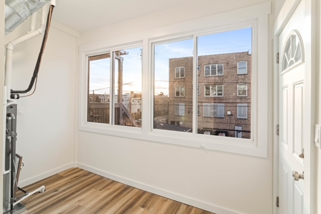 1018 North Harding Avenue Chicago, IL 60651 - Photo 28 of 38 a view of empty room with windows