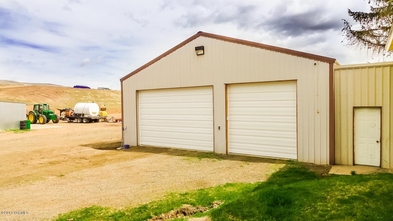 1993 Cook Road Yakima, WA 98908 - Photo 2 of 25 a view of yellow house with a outdoor space
