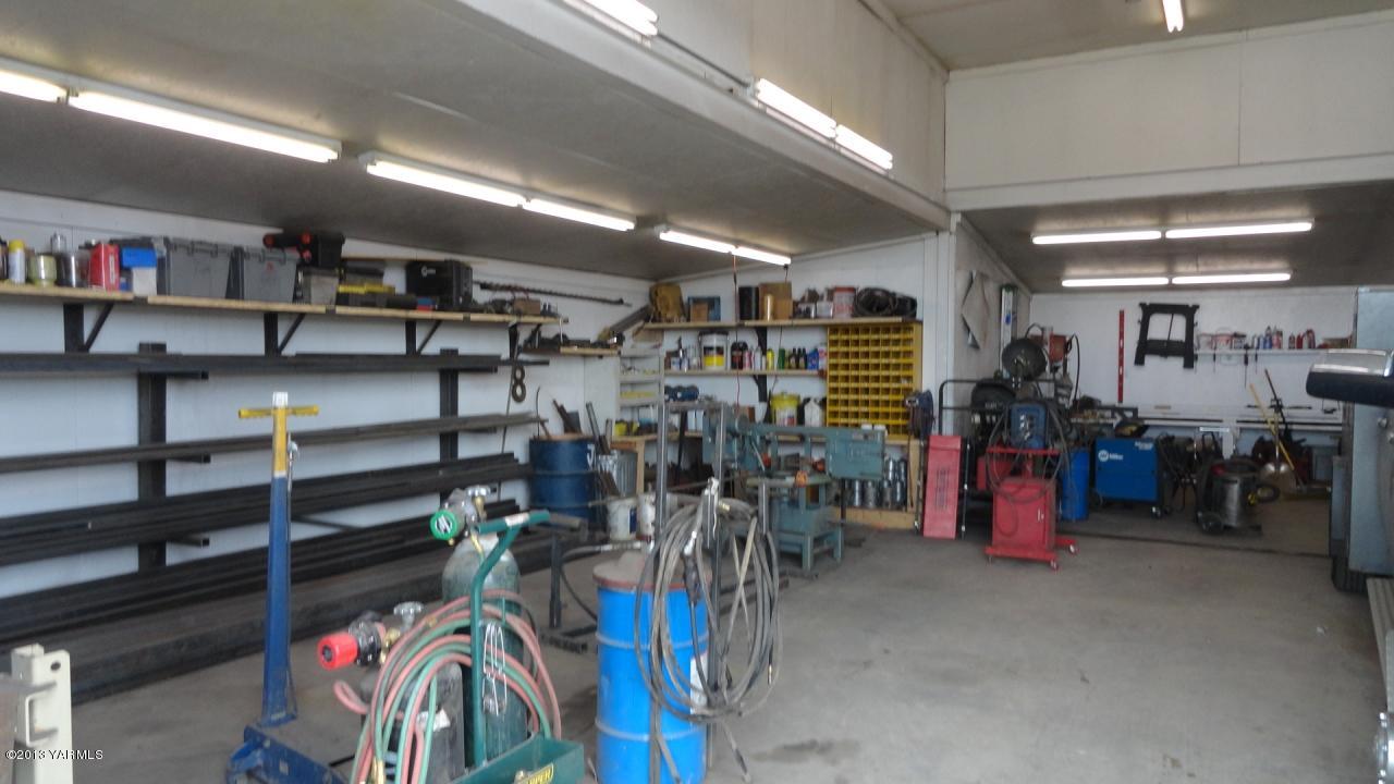 1993 Cook Road Yakima, WA 98908 - Photo 14 of 25 a view of a storage room with racks