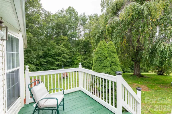 a view of a two chairs in the deck