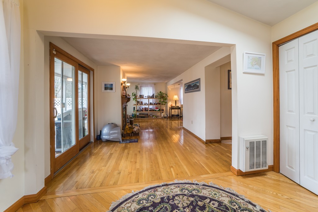14 Magnolia Road Natick, MA 01760 - Photo 2 of 11 a view of a living room hardwood floor and a living room