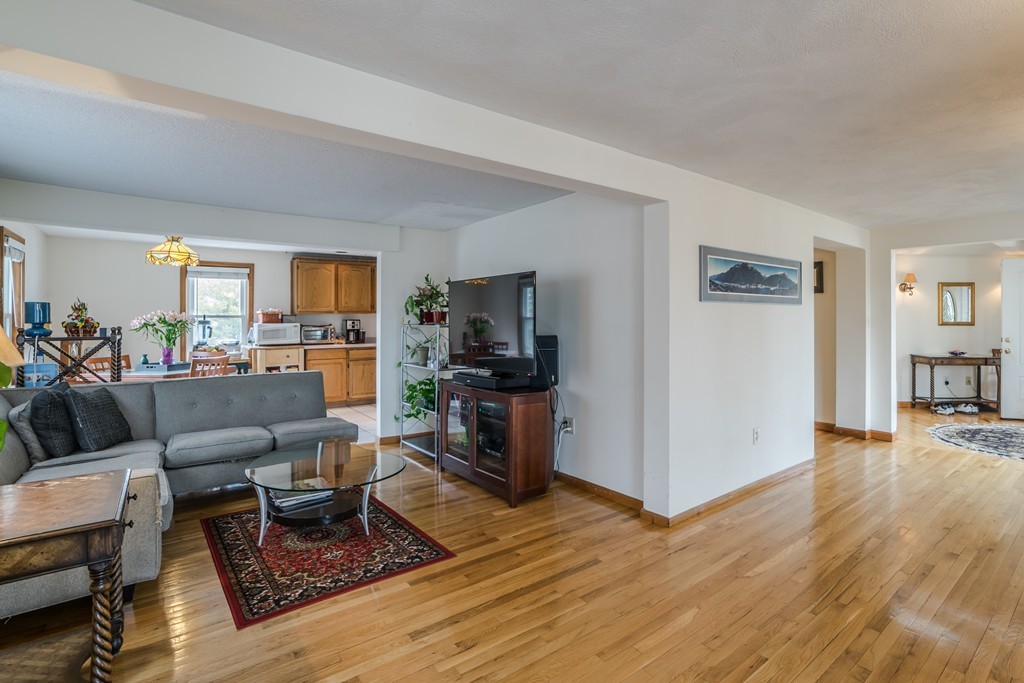 14 Magnolia Road Natick, MA 01760 - Photo 4 of 11 a living room with furniture and a wooden floor
