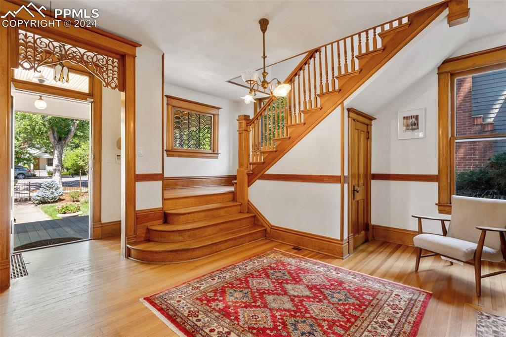 1331 North Tejon Street Colorado Springs, CO 80903 - Photo 6 of 45 a view of entryway and hall with wooden floor