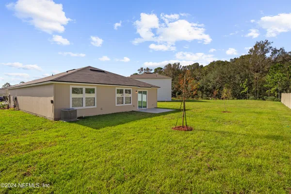 a house view with a garden space