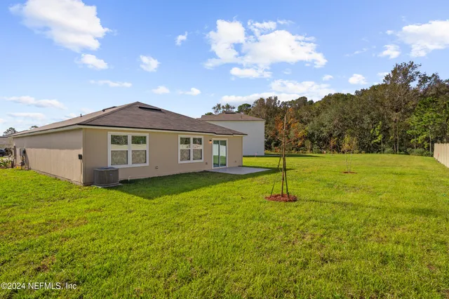 a house view with a garden space
