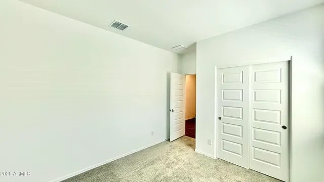 an empty room with closet