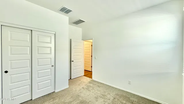 an empty room with closet