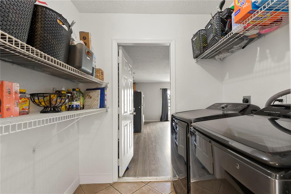 9917 Nelson Road Dade City, FL 33525 - Photo 21 of 40 a view of a walk in closet